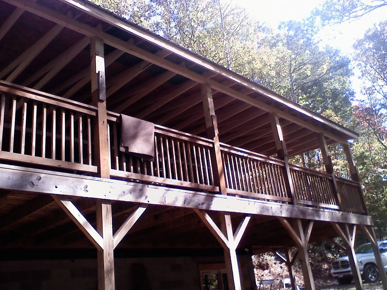 Timber framing under a new elevated porch and deck — Roof Leak Repair in Carleton by Roofing Brothers